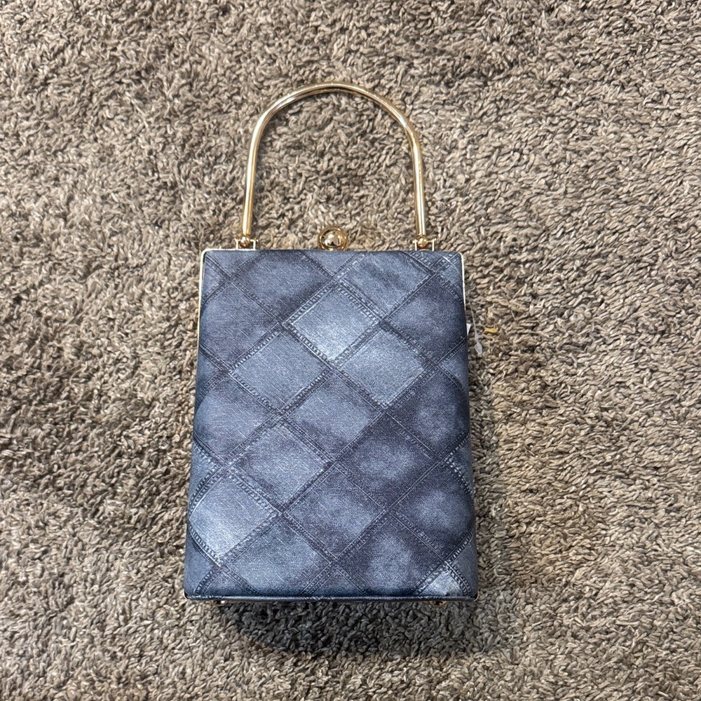 Elegant Navy Handbag with Gold Accents